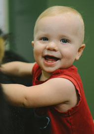 Boy in red shirt