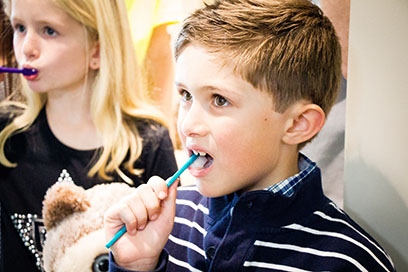 Kids brushing teeth