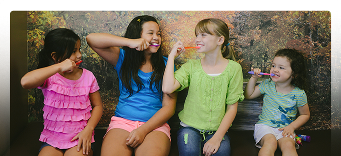 Kids brushing teeth